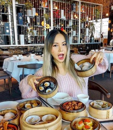 Chloe Ting enjoying dumpling.